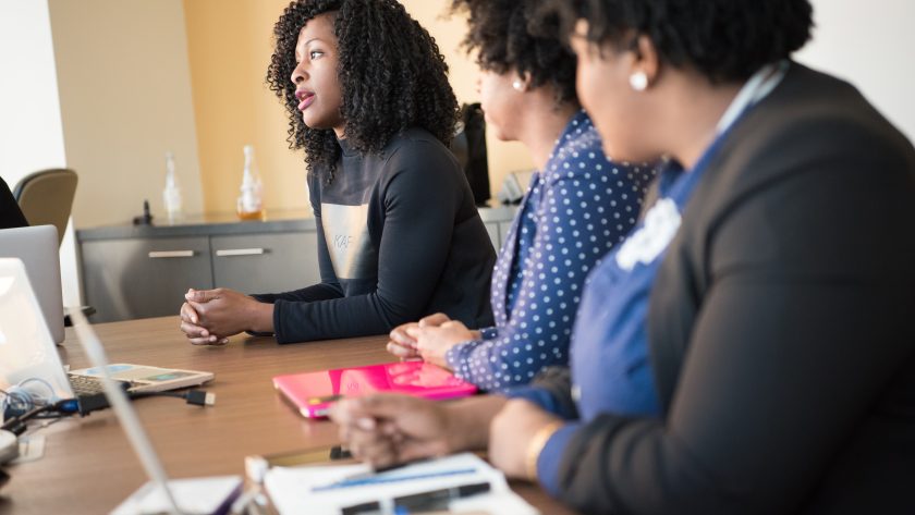 3 African American woman are sitting and talking