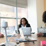 3 African American woman are sitting and talking